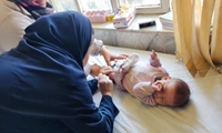 استقرار کشیک غربالگری نوزادان در مرکز خدمات جامع سلامت شهید عشرتی شهرستان قدس